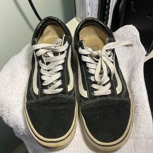 Vans in a size 7.5 color is black and white